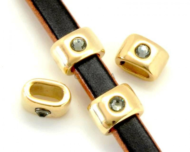 Entrepieza Zamak/SWAROVSKI. Media caña. Oval strass. 15x10mm. Oro-Black diam. Int10x5