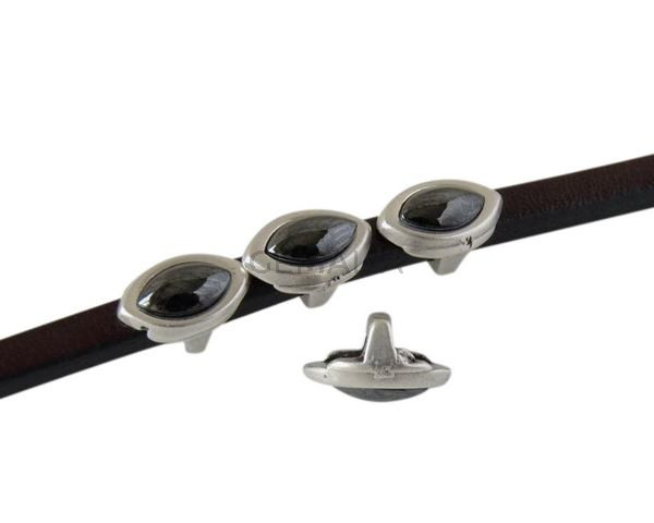 Entrepieza de SWAROVSKI hoja 8x5mm. Plateado-Jet Hematite Pearl. Int.3x2mm