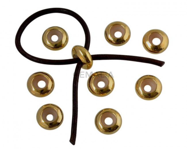 Rondel de laton con silicona 10x4,2mm. Dorado. Int.3mm