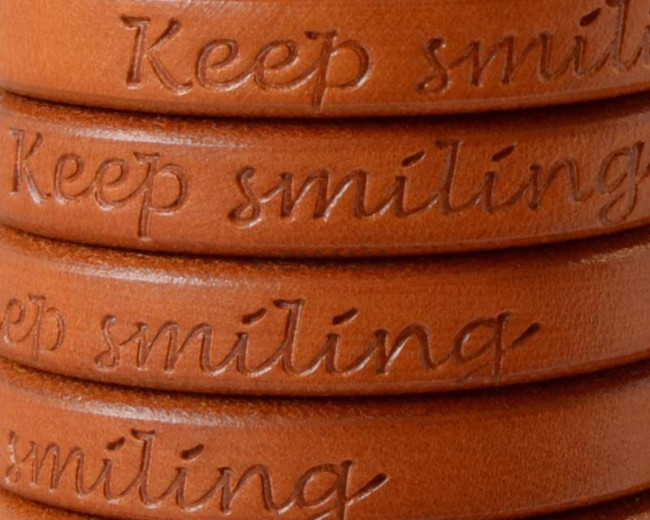 REGALIZ Leather cord. Oval 10x6mm. Keep Smiling. Camel. Best Quality.