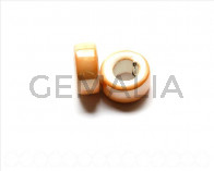 Ceramic. Rondell, 23x10mm. Oil light brown. Int.11mm.